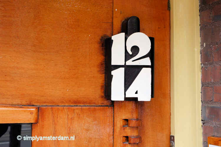 Typical Amsterdamse School design house numbers